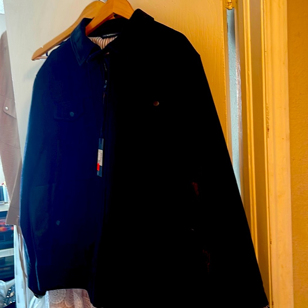 It’s a black man’s jacket extra-large never been one text Dylan